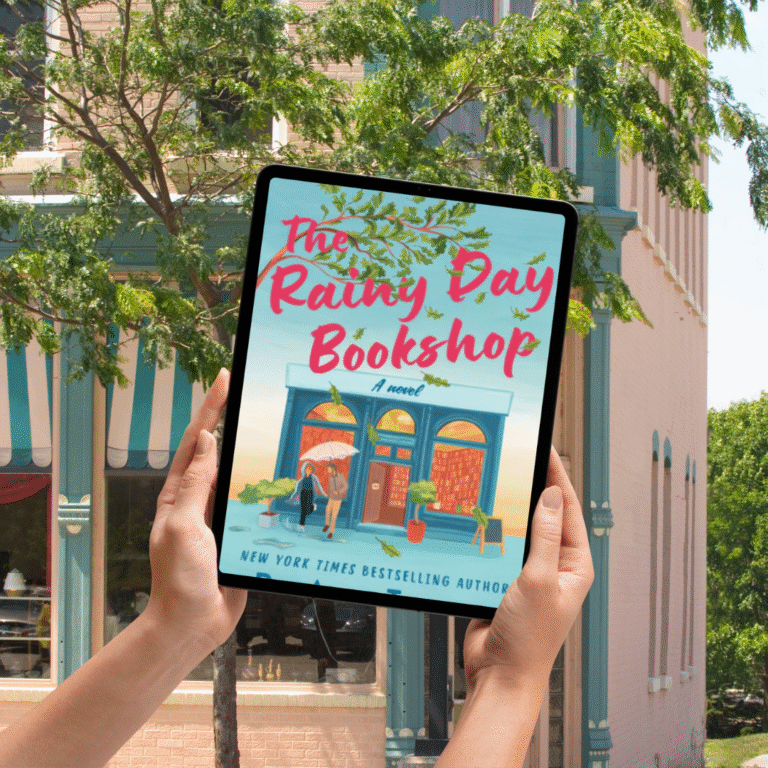 Woman hands lifting an ereader with the book the rainy day bookshop with a building in the background that looks like a bookstore